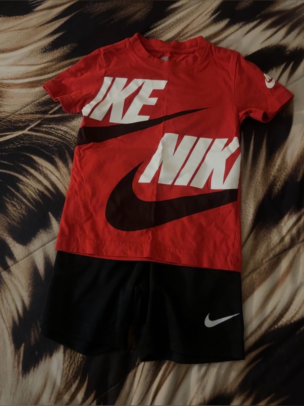 Nike Red Tee with Black Shorts and White Swoosh